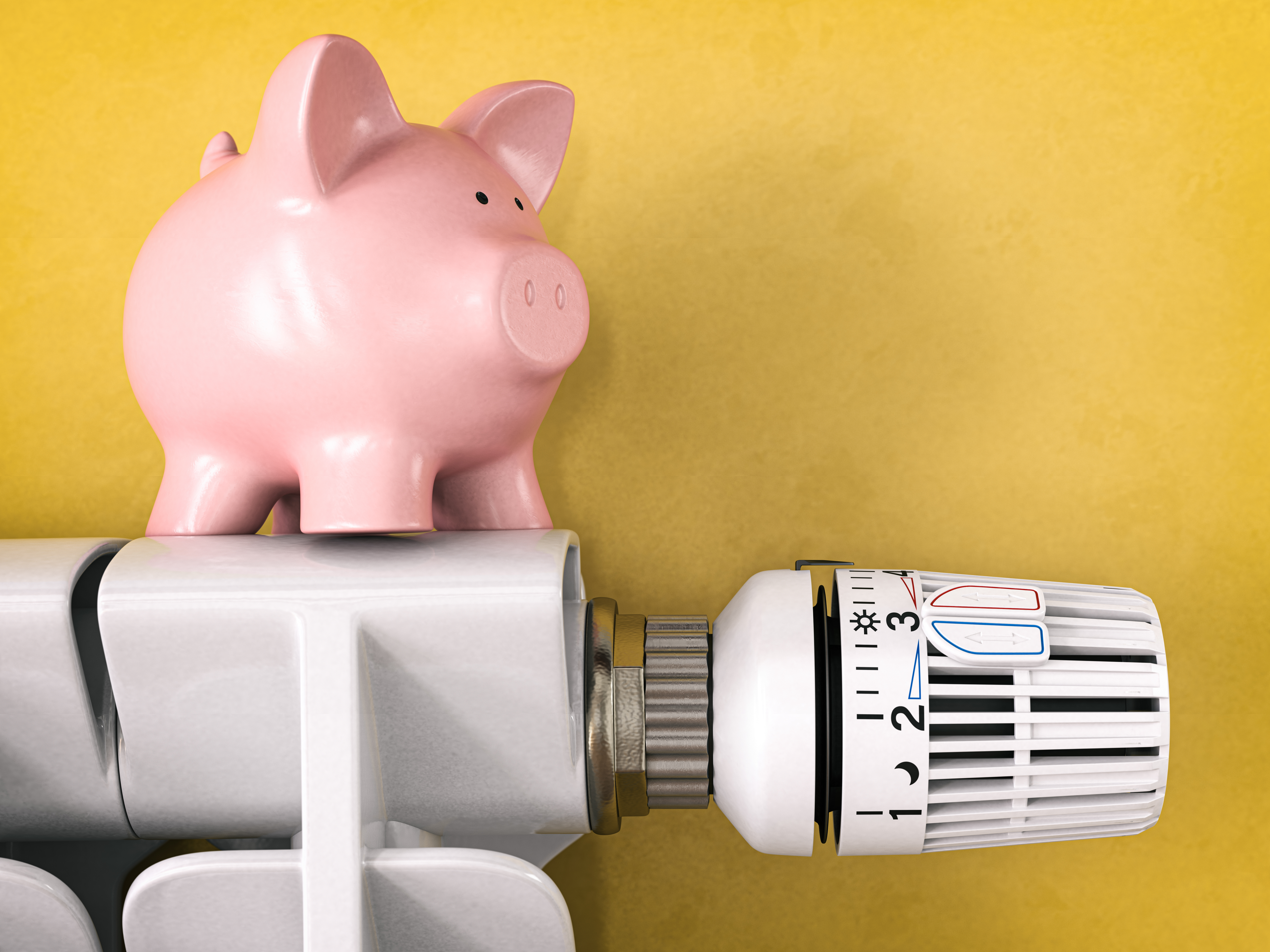 Pink piggy bank on a home radiator with a thermostat valve, symbolizing energy savings and cost efficiency.
